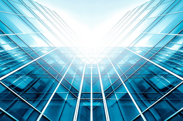 Panoramic and perspective wide angle view to steel light blue background of glass high rise building skyscraper commercial modern city of future. Business concept of success industry tech architecture